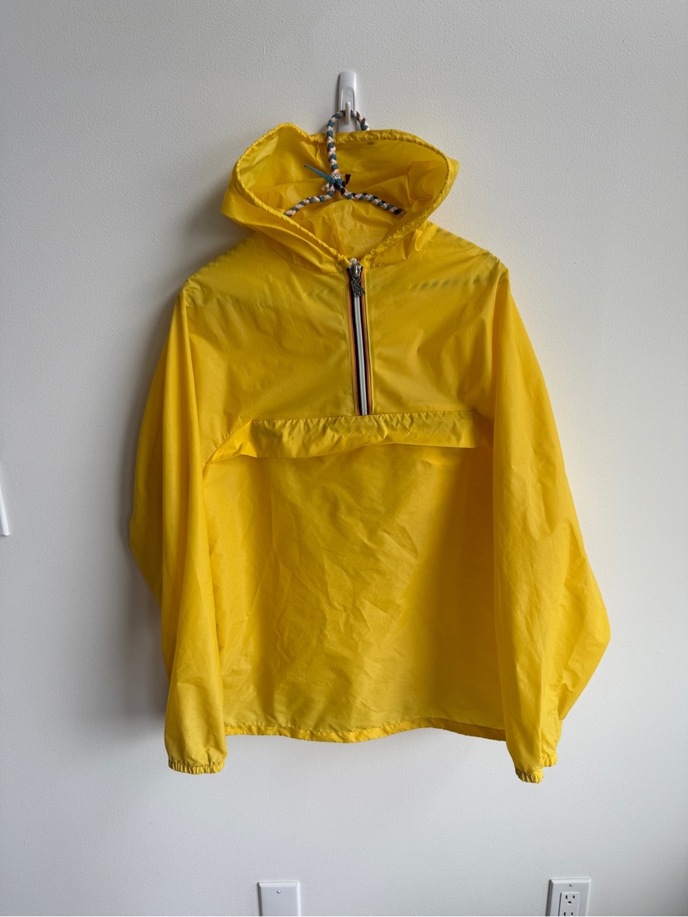Vintage KWay windbreaker 
Tagged as size 5
IMO it would fit a med/lg